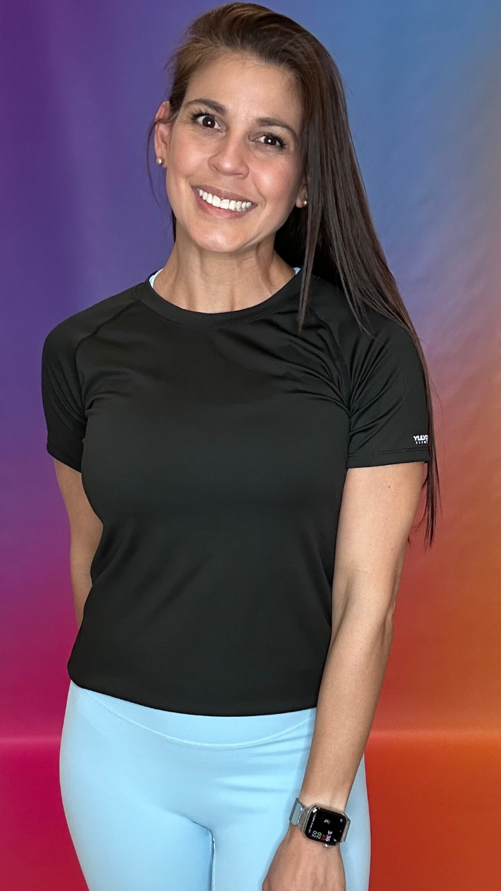 Back view of Catalyst Shirt in pink — flexible and breathable activewear