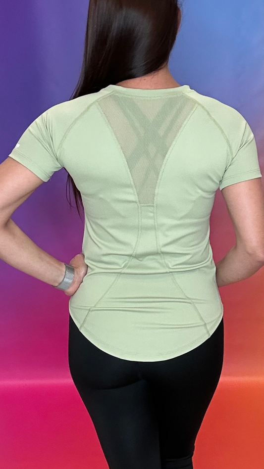 Back view of Catalyst Shirt in green — ventilated mesh panel for cooling airflow