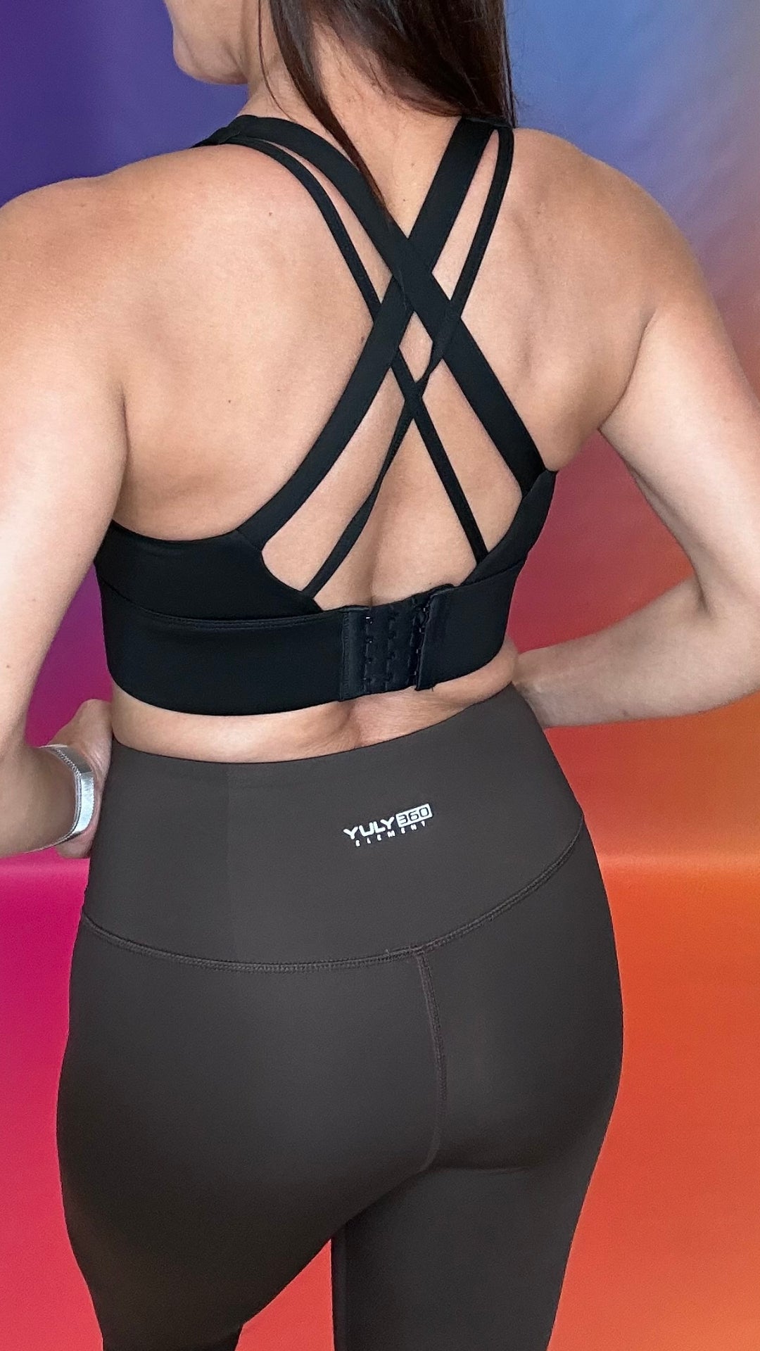 Closer Back view of chocolate brown Emerge Legging showing flattering fit