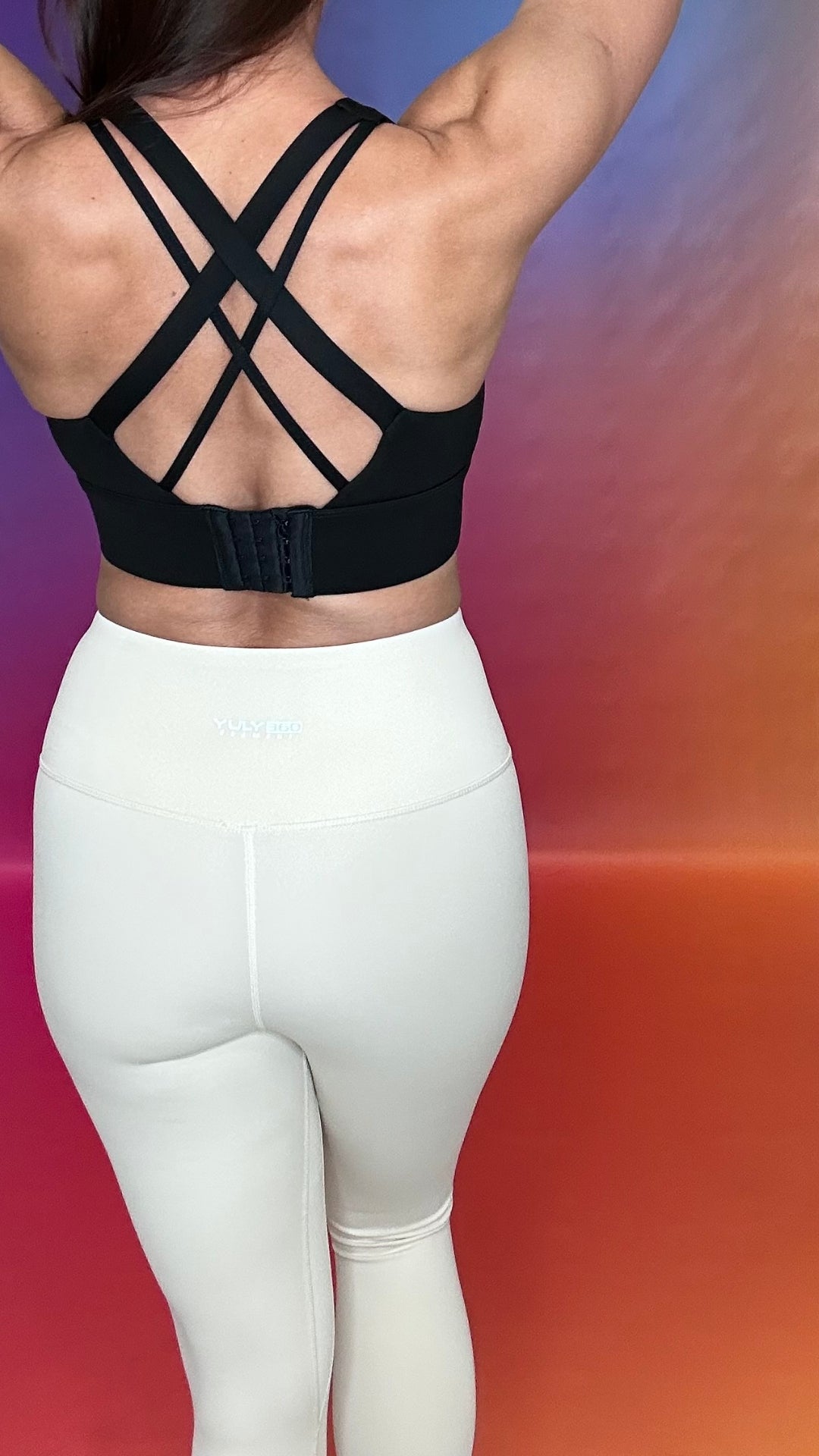 Emerge Legging in beige shown with strappy crossback sports bra