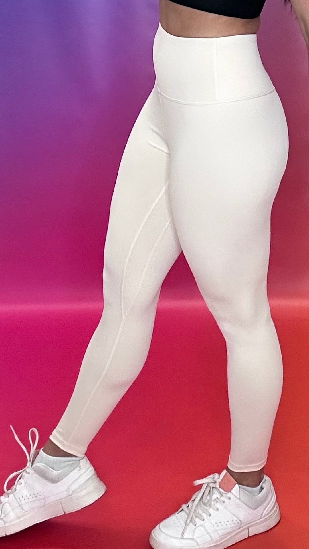 Side profile of Emerge Legging in beige highlighting seam detail