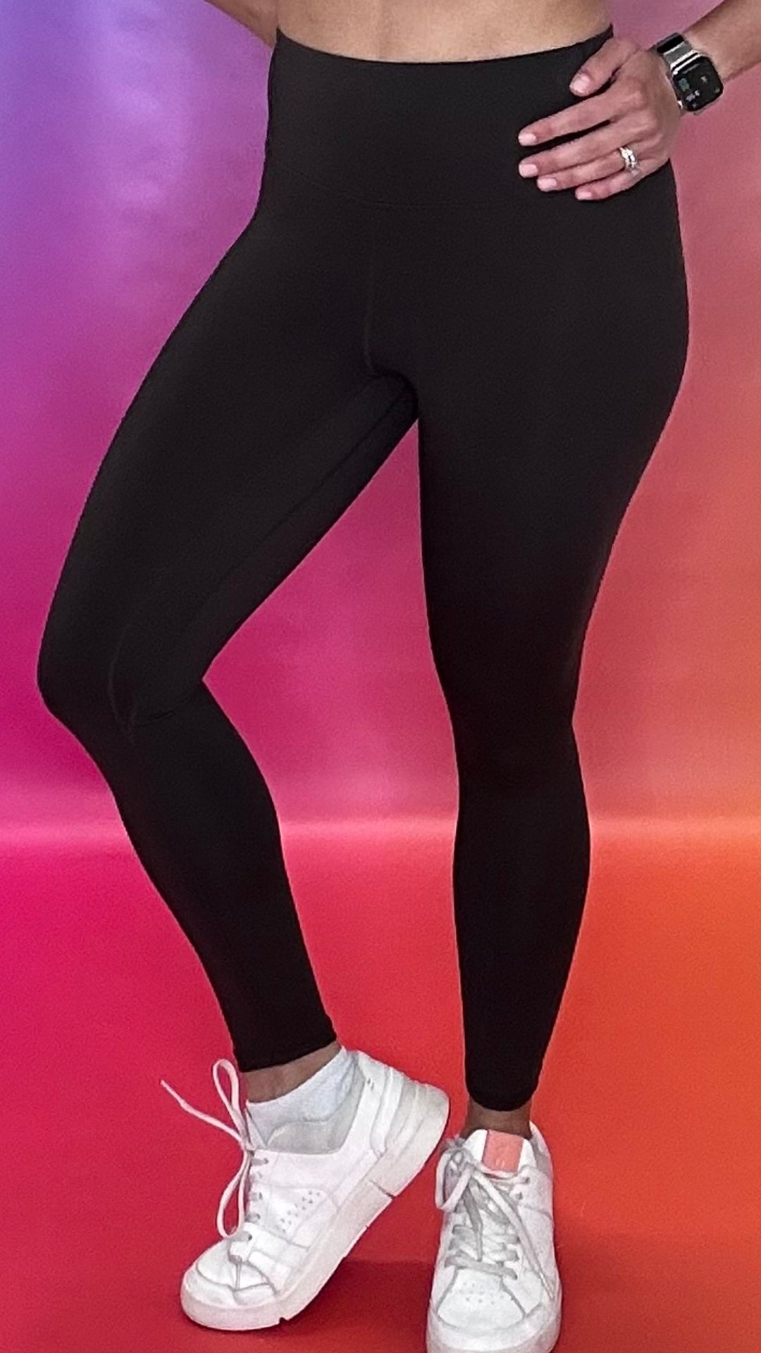 Woman wearing Brown Emerge Legging front view