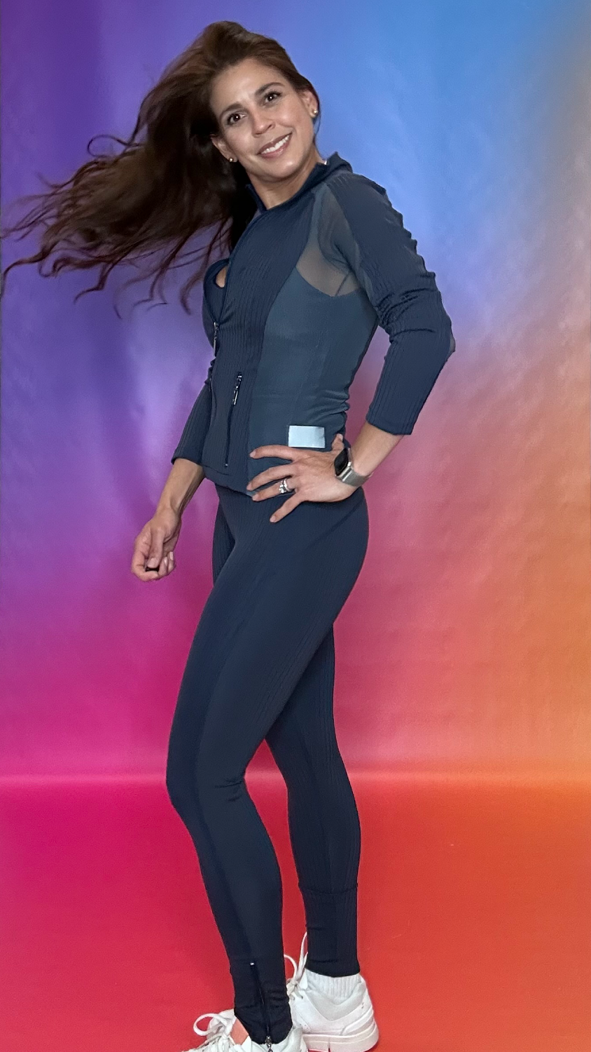 Model full body view wearing Enclave Jacket navy — sleek gym to street activewear