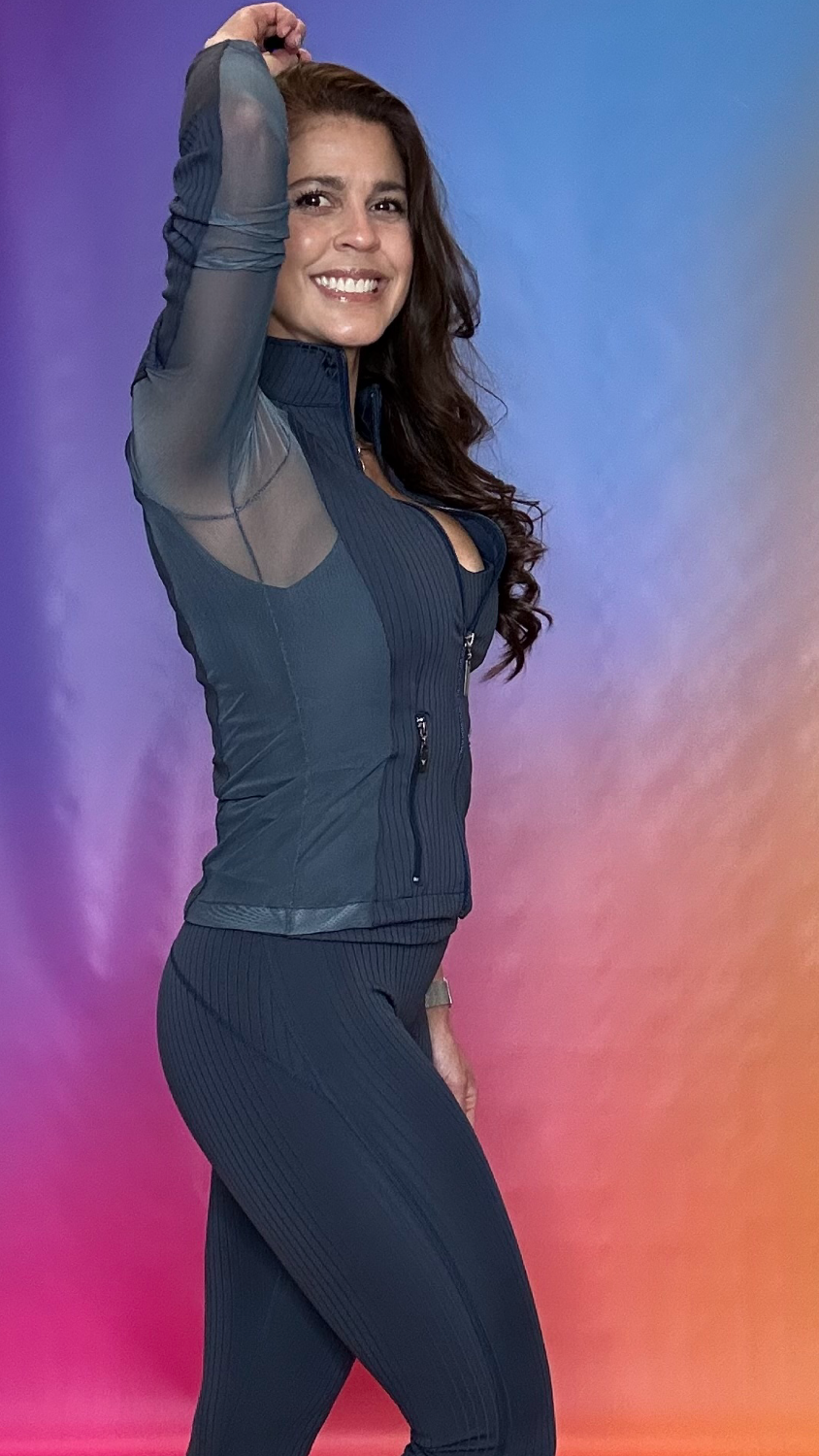 Side profile of Enclave Jacket in navy — stylish fitted performance jacket