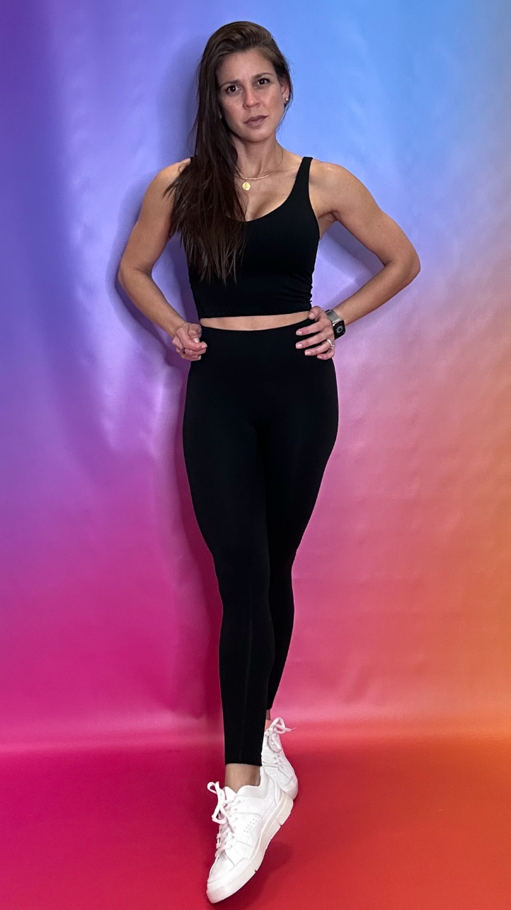 Front view of Odyssey Bra in black — sleek supportive activewear support