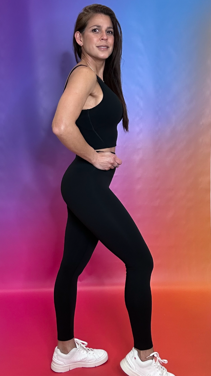 Side profile of Odyssey Bra in black — durable moisture-wicking workout bra