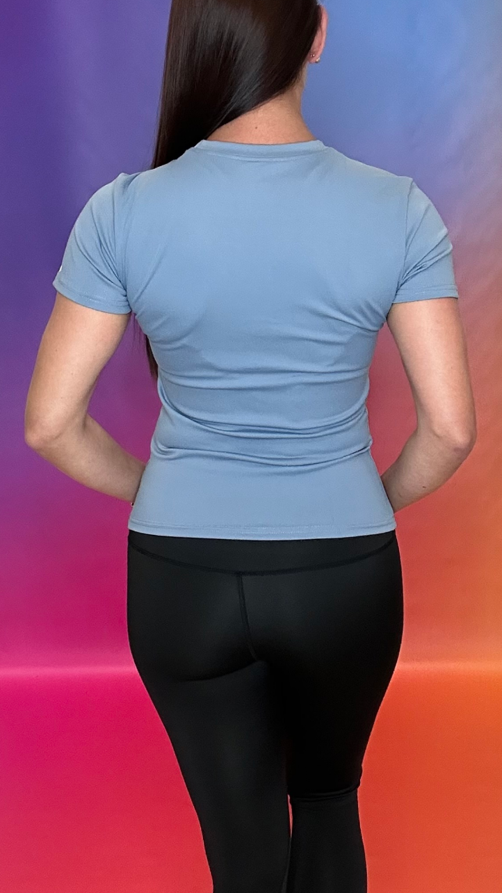 Back view of Summit Shirt in ice — body-hugging breathable sportswear
