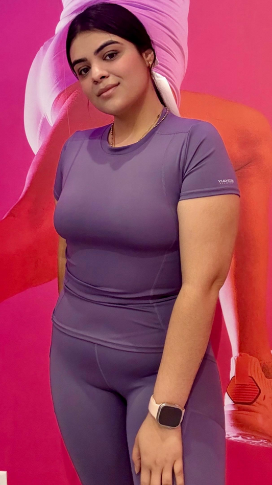 Front view of Summit Shirt in purple — vibrant color sculpted activewear