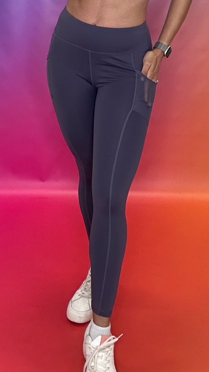 Front view of Synergy Leggings in plum — lightweight compression activewear