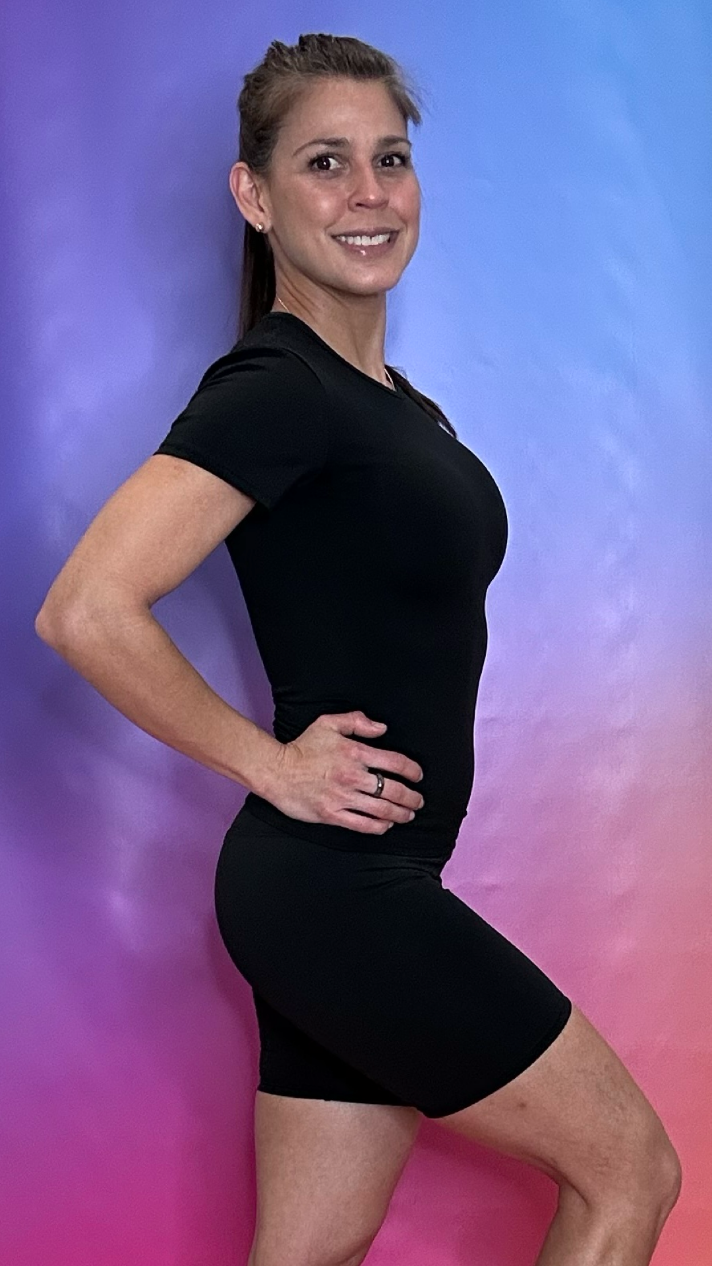 Side profile of Trek T-shirt in black — lightweight flexible workout shirt